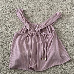 Free people size small cropped shirt NWOT.  Matching pants available in closet